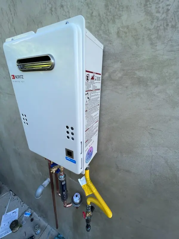 Tankless water heater installation for Wellman homes